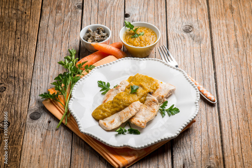 chicken fillet with carrot and capers cream sauce