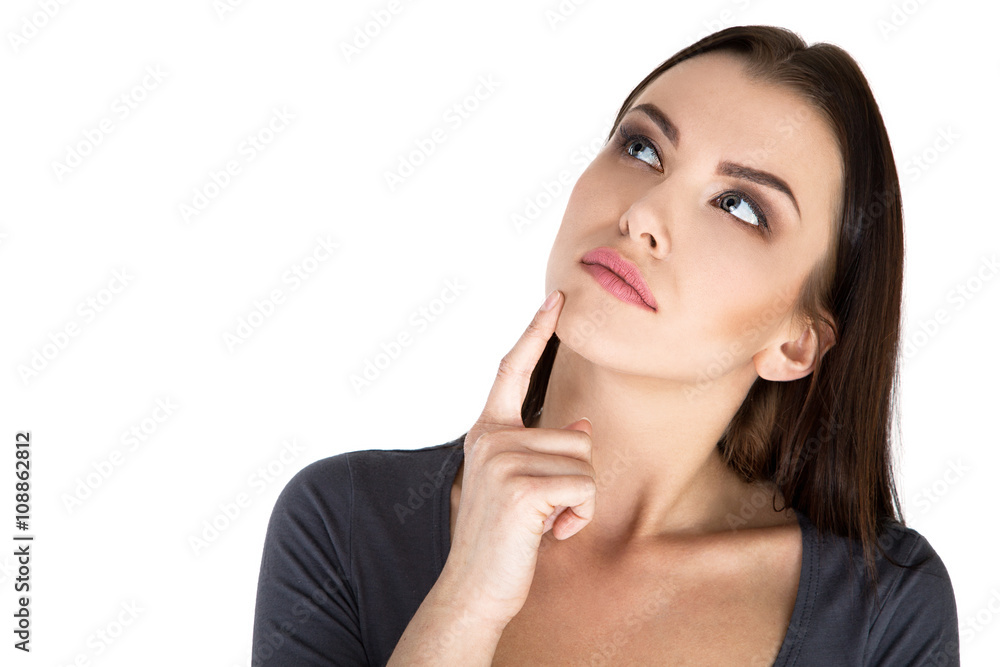 Contemplative thinking woman at a white background Stock Image Contemplative thinking woman at a white background Stock Image