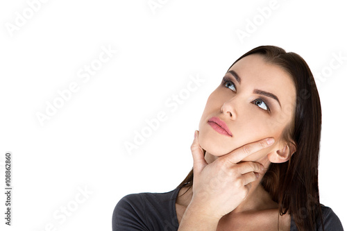 Contemplative thinking woman at a white background Stock Image