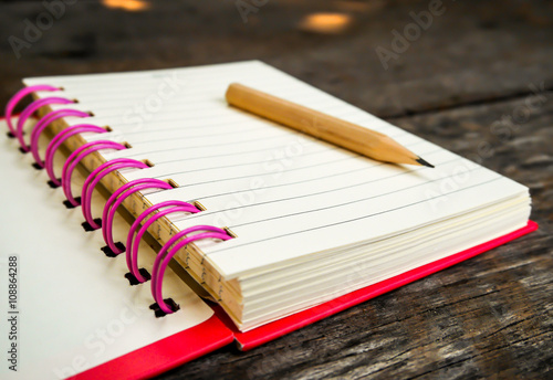 Note book on wooden table