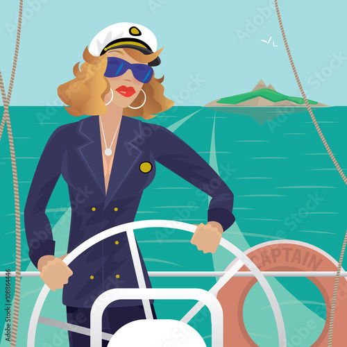 Serious female sea captain standing on the deck of the ship and rotates ship steering wheel. Sunny weather. Behind you can see the island - Profession or Sailor concept