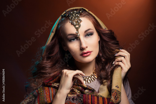 Beautiful young woman in shawl