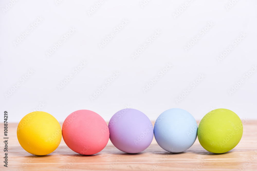 Easter eggs on wood floor Easter eggs on wood floor