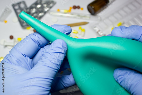 Photos Enema in the hands of a doctor
