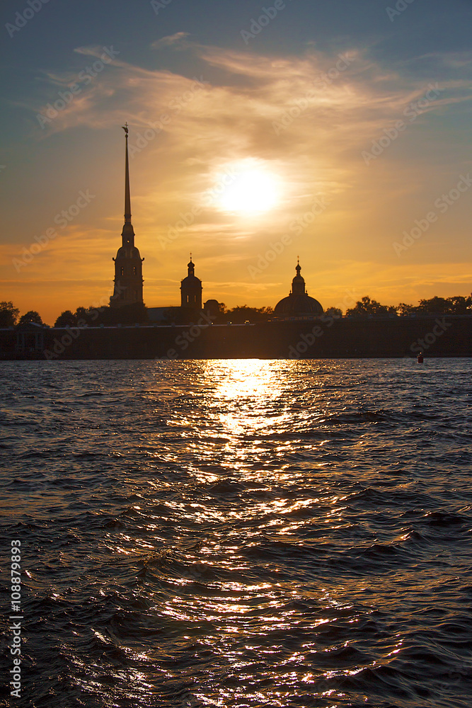 View of the Cathedral of Peter and Paul Fortress at sunset. Saint Petersburg. Russia.