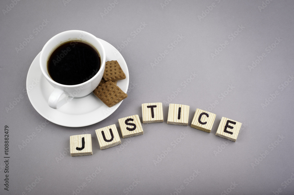 Text: Justice from wooden letters on a gray background. Text: Justice from wooden letters on a gray background.