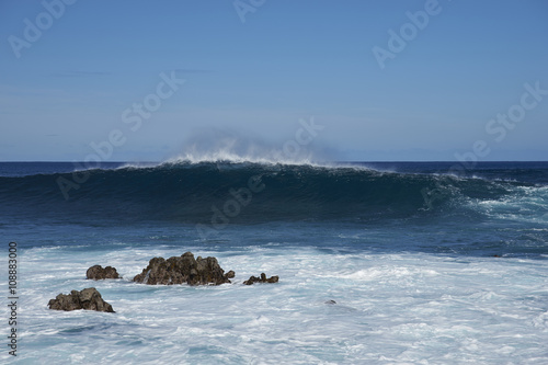 Waves coming ashore on the rocky coast of Easter Island (Papa Nui) in the Pacific Ocean