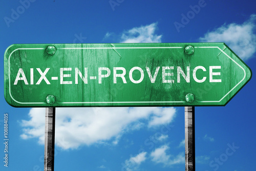 aix-en-provence road sign, vintage green with clouds background