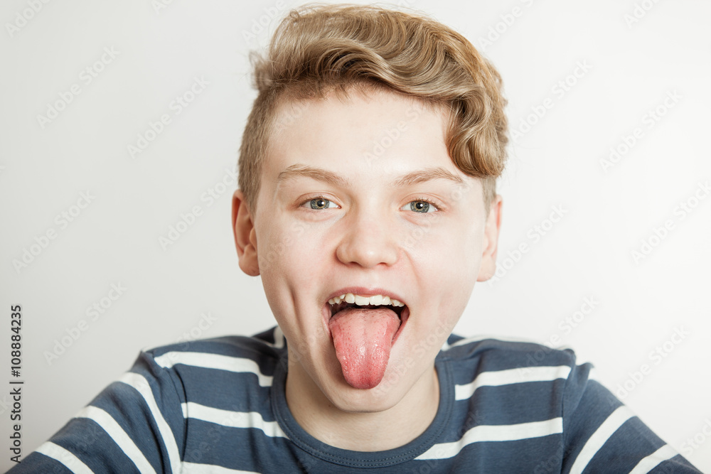 Young boy sticking out his tongue Young boy sticking out his tongue