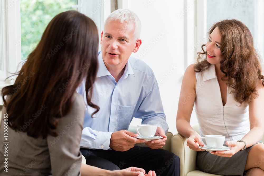 Advisor giving investment advice to senior couple Advisor giving investment advice to senior couple