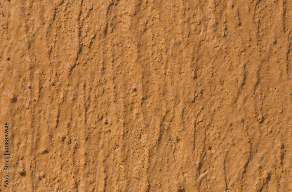 Textured brown wall with pattern Textured brown wall with pattern