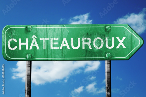 chateauroux road sign, vintage green with clouds background photo