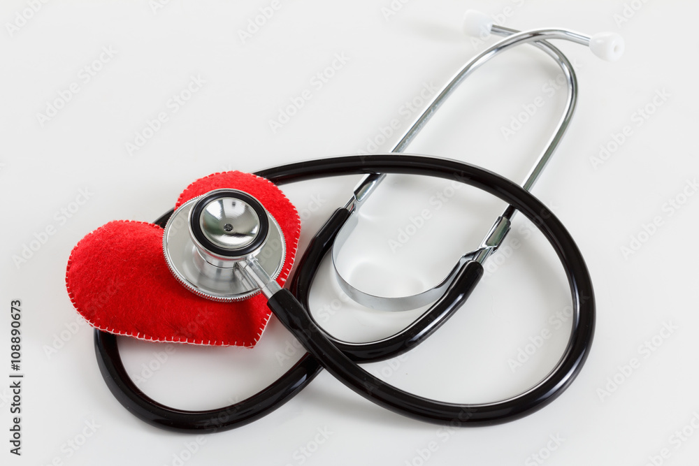 Red heart and a stethoscope on white background Red heart and a stethoscope on white background