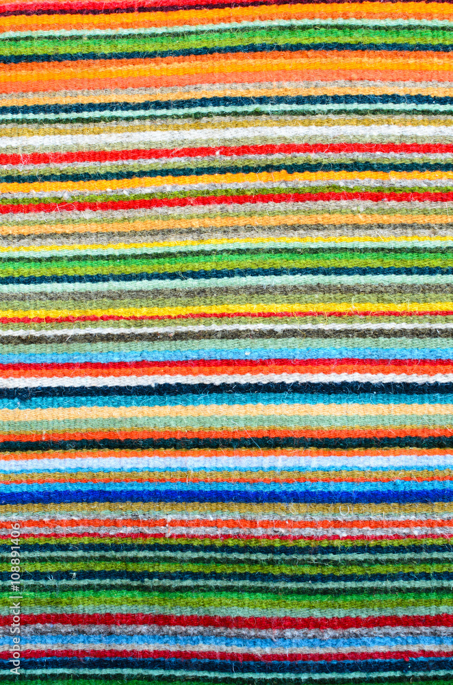 Pattern of colorful stripes - closeup of a woven carpet Pattern of colorful stripes - closeup of a woven carpet