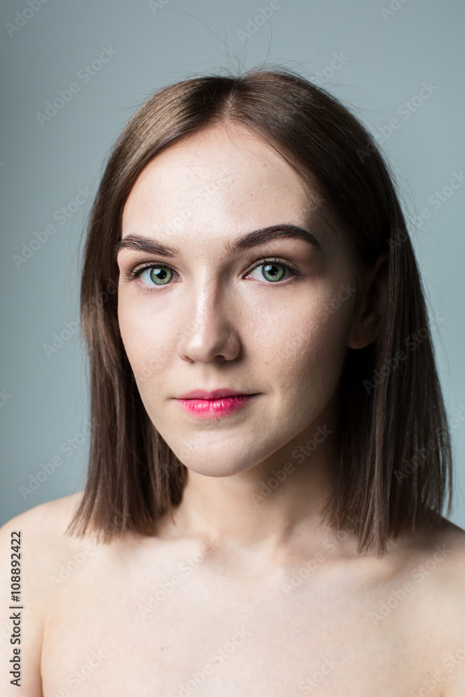 Beauty portrait of young model with middle length hair. Professional nude makeup. Green eyes. Beauty portrait of young model with middle length hair. Professional nude makeup. Green eyes.