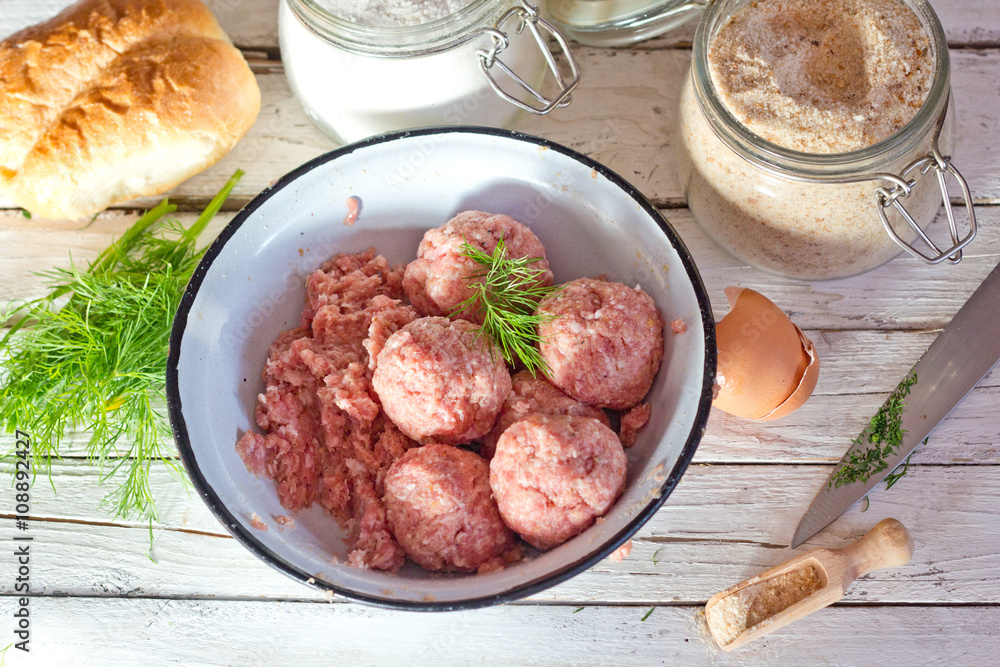 Cooking large homemade meatballs for dinner. Cooking large homemade meatballs for dinner.