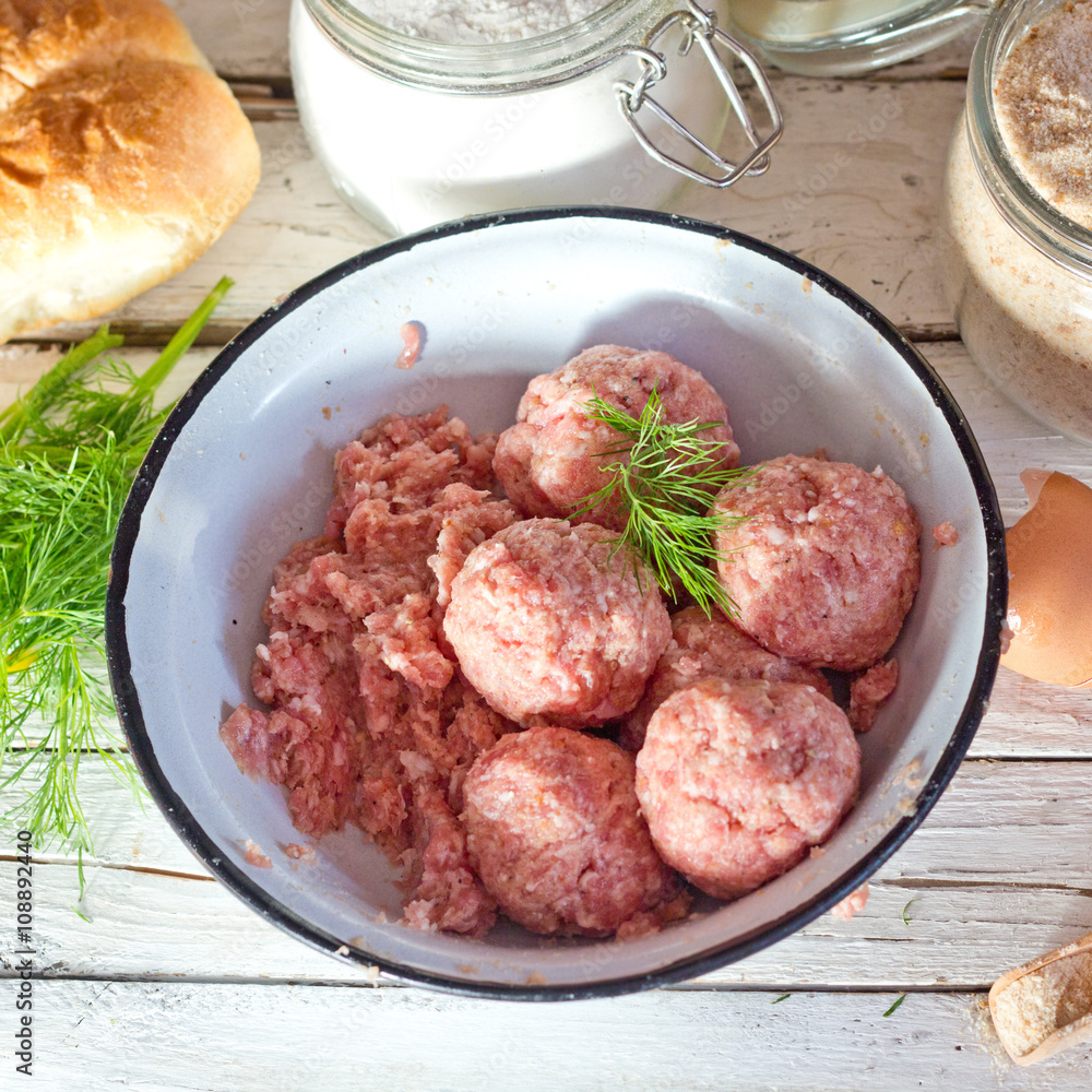 Cooking large homemade meatballs for dinner. Cooking large homemade meatballs for dinner.