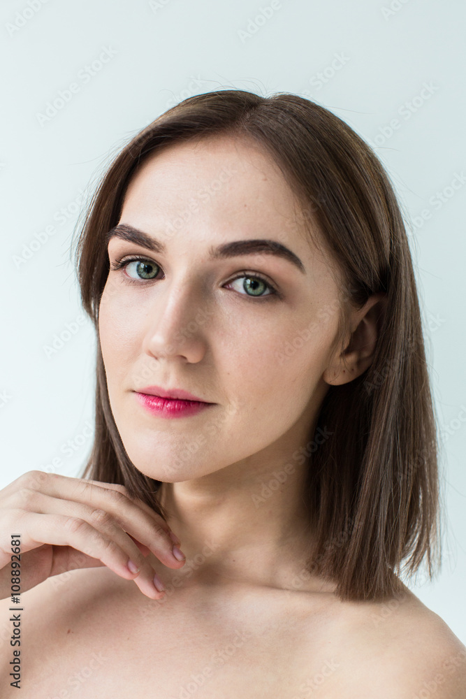 Beauty portrait of young model with middle length hair. Professional nude makeup. Green eyes. Beauty portrait of young model with middle length hair. Professional nude makeup. Green eyes.