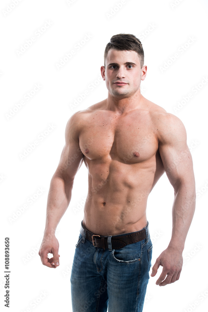 Sexy smiling shirtless male model with muscular body and abs against isolated white background looking to the camera