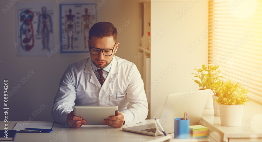 Doctor with tablet computer