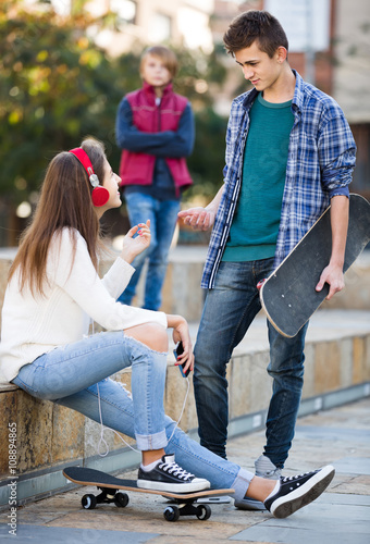 Jealous teen and his friends after conflict photo