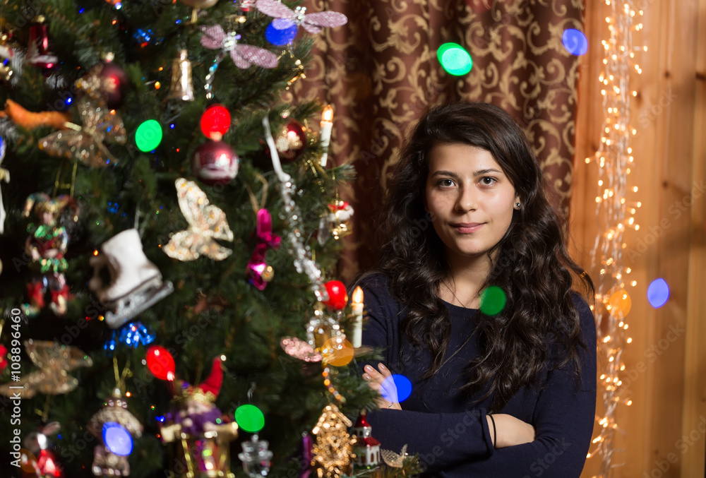 Smiling girl with Christmas tree Smiling girl with Christmas tree