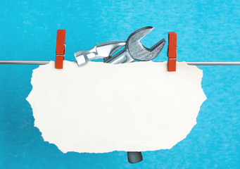 cardboard hammer and a wrench. info concept. raw style effect