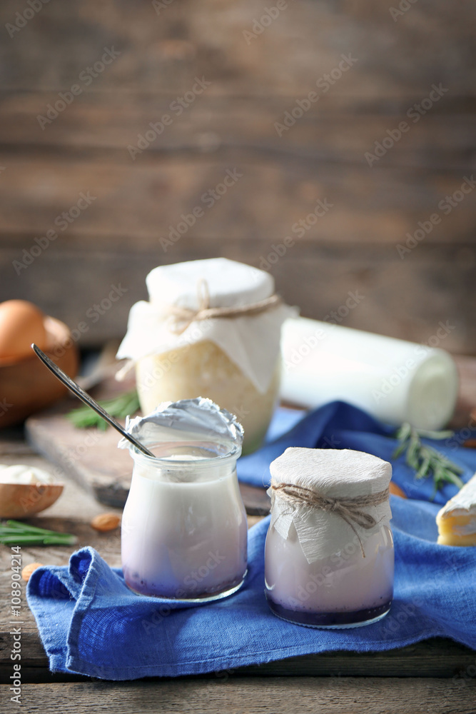 Set of dairy products on wooden table closeup Set of dairy products on wooden table closeup