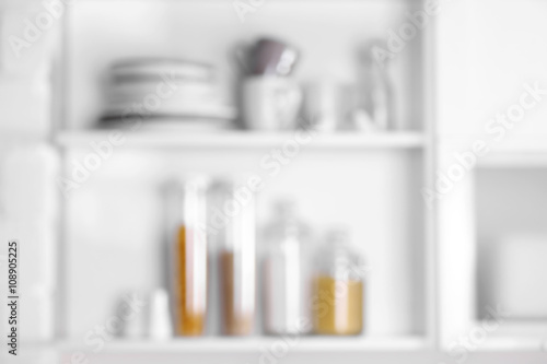 Tableware and kitchenware on a shelves