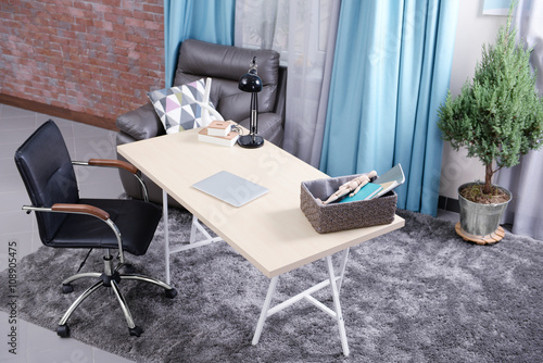 Workplace with table, offic...