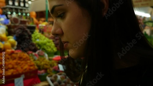 Woman on Fruit Market in Municipal Market (Mercado Municipal) in Sao Paulo, Brazil