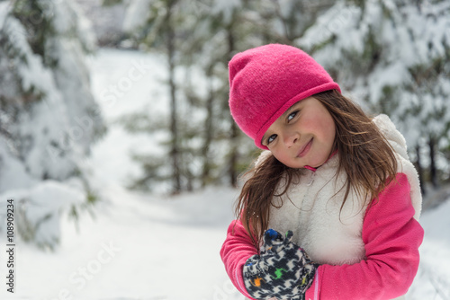 Portrait of a little girl in winter