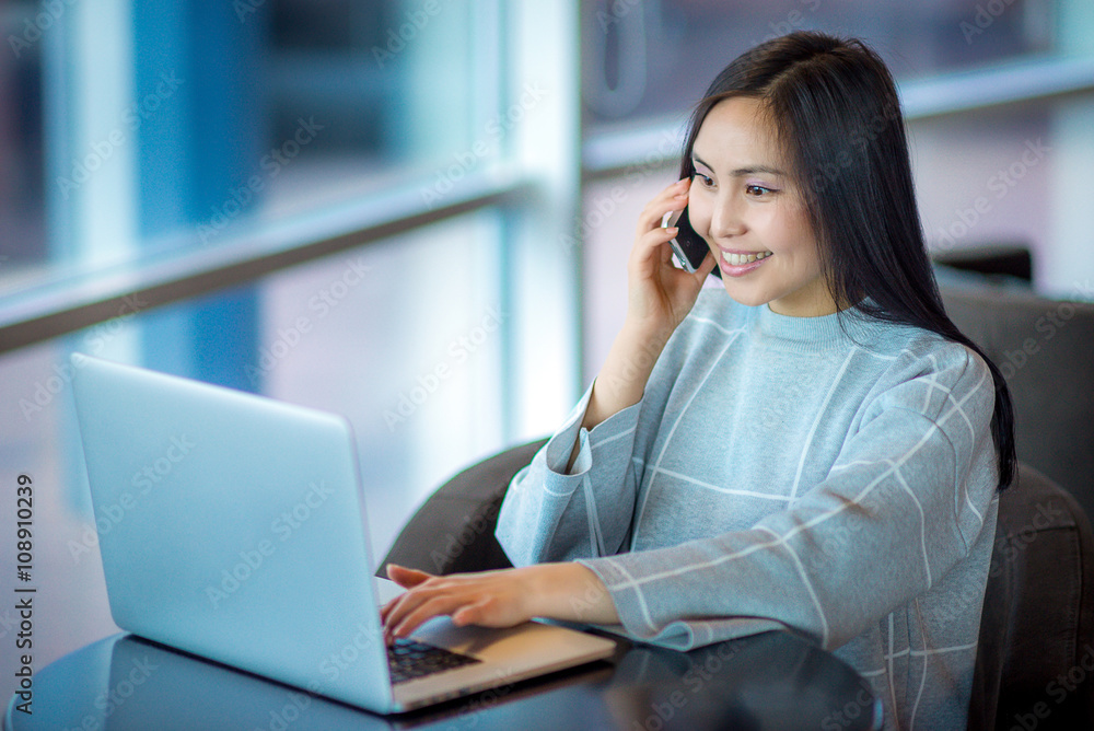 Female using laptop Female using laptop
