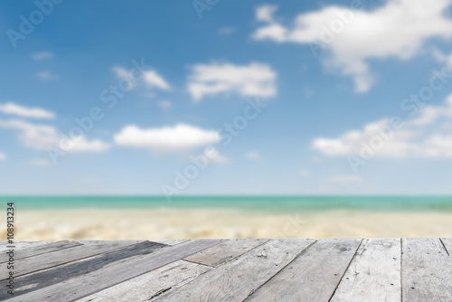 Fototapeta Naklejka Na Ścianę i Meble -  Wood floor top on blue sea background