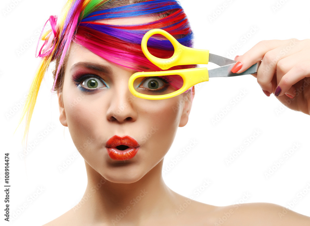 Fototapeta premium Beautiful girl with colorful makeup, manicure and hairstyle on white background