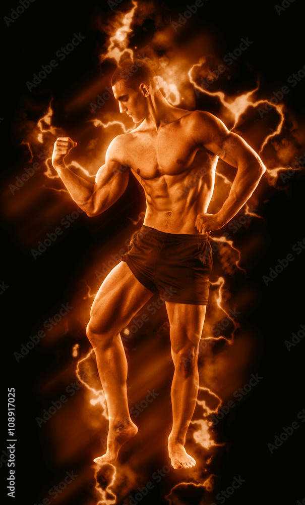 Sexy Athletic Man showing six pack abs with fire