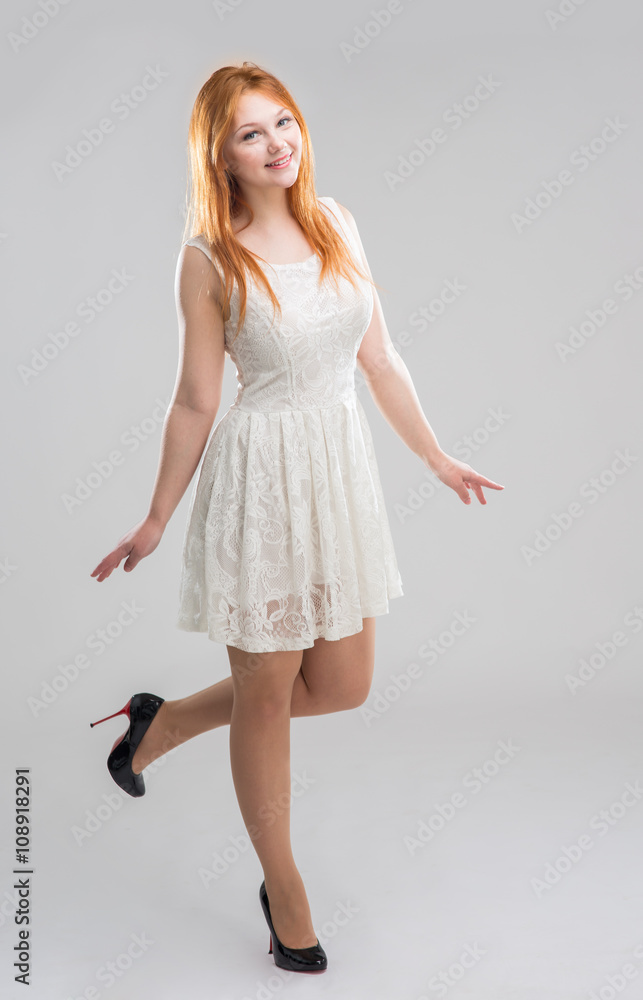 young woman in a white dress young woman in a white dress