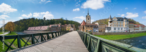 panorama of the bridge and the church in a small German town