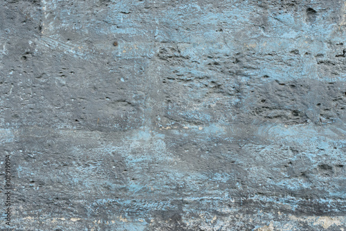 Wall fragment with attritions and cracks