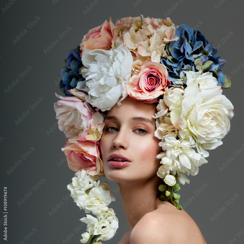 Obraz premium Beautiful woman with flowers in her hair. Bouquet of Beautiful F