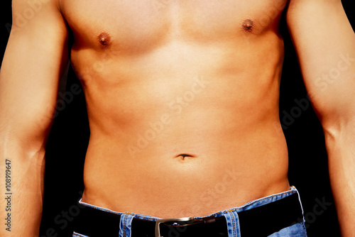 Fotografi Young athletic man with muscular torso