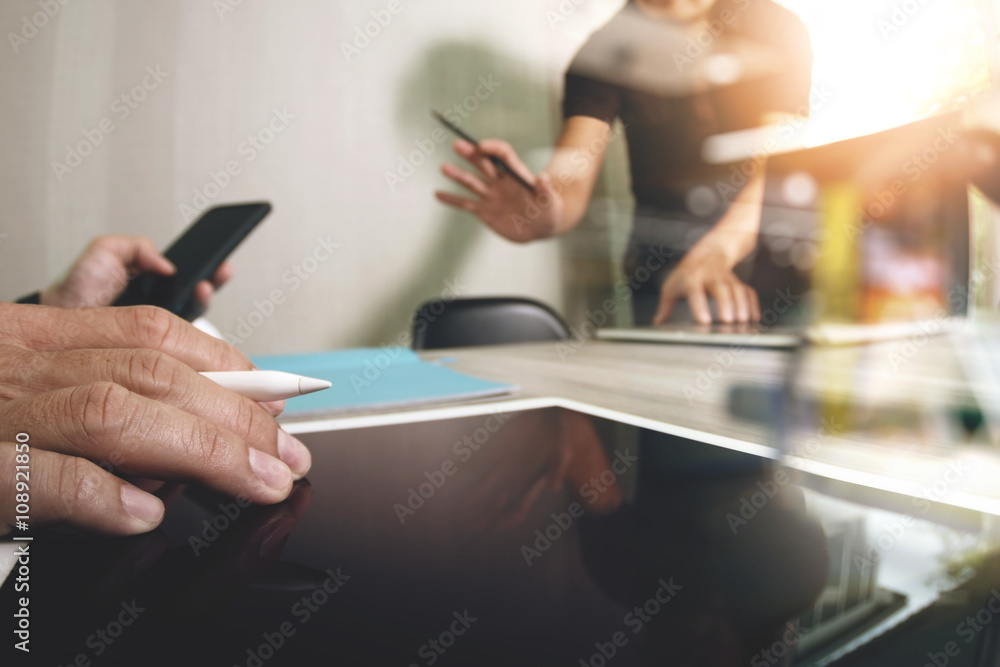 Fototapeta premium two colleagues web designer discussing data and blank screen dig