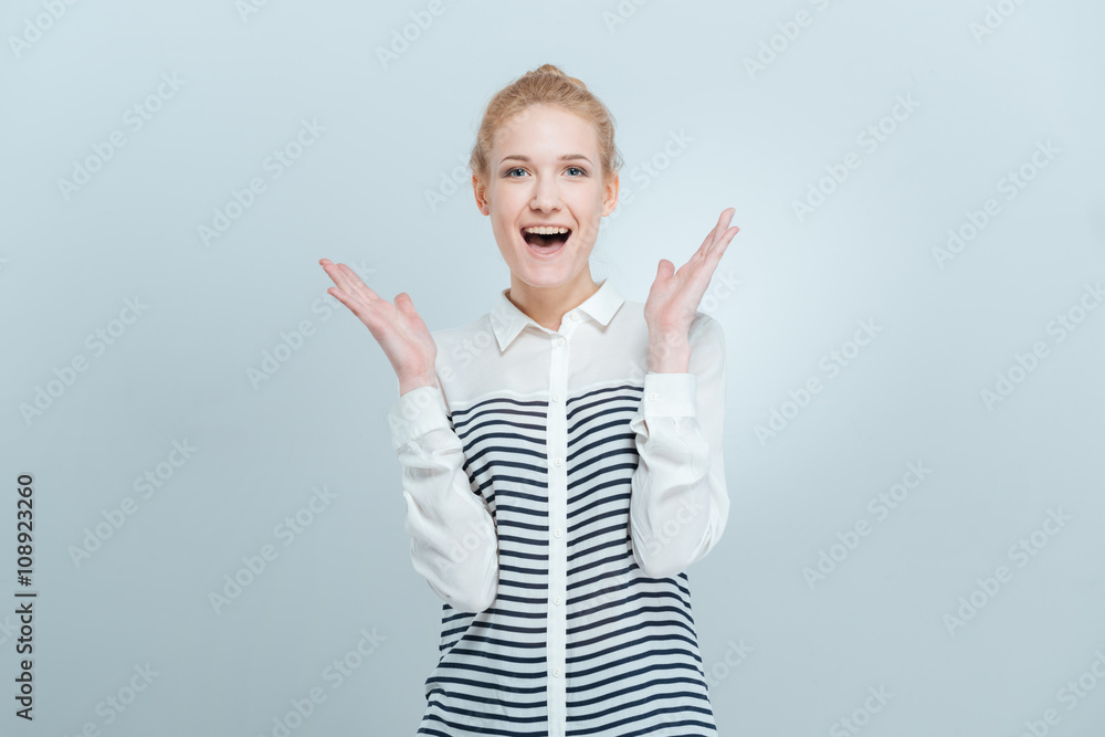 Fototapeta premium Cheerful woman with mouth open looking at camera