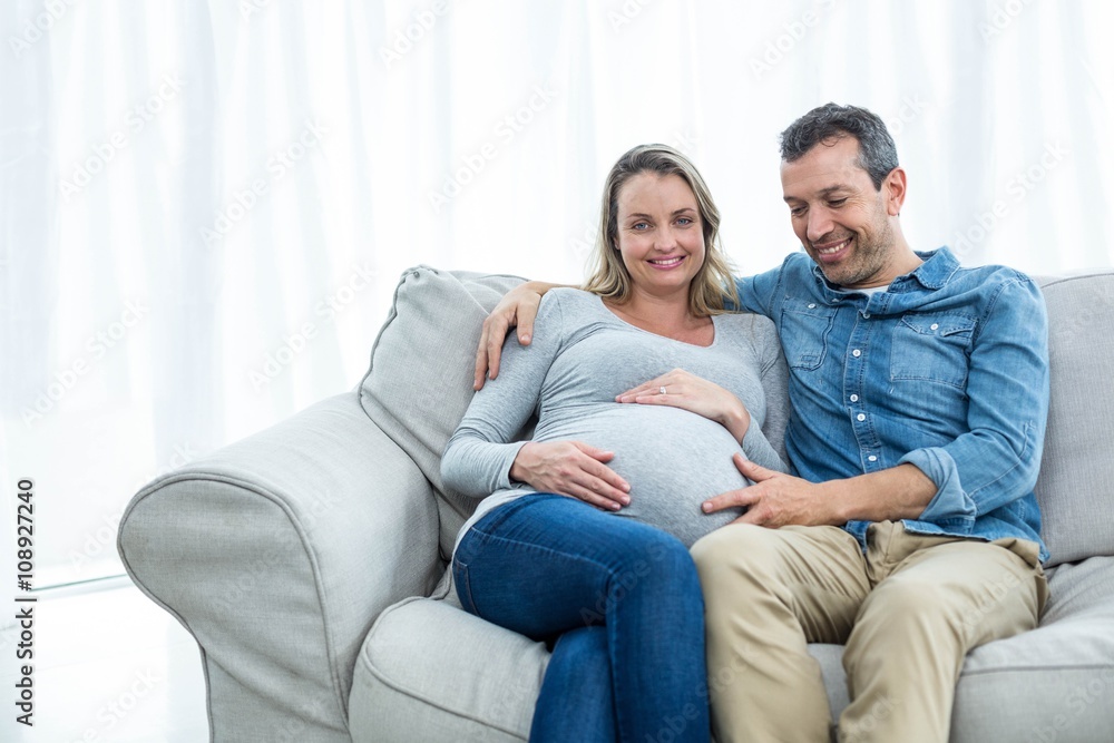 Couple sitting on sofa Couple sitting on sofa