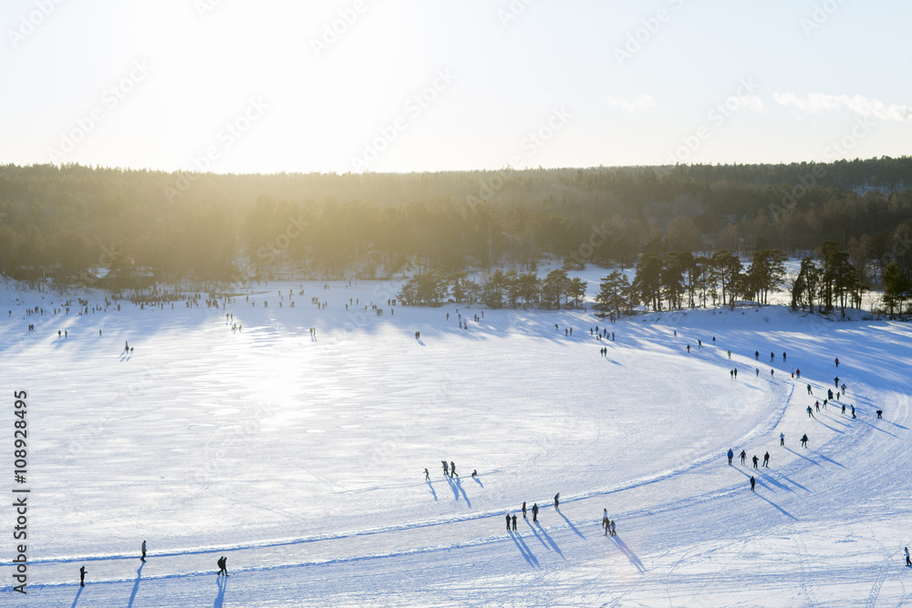 People around ice rink