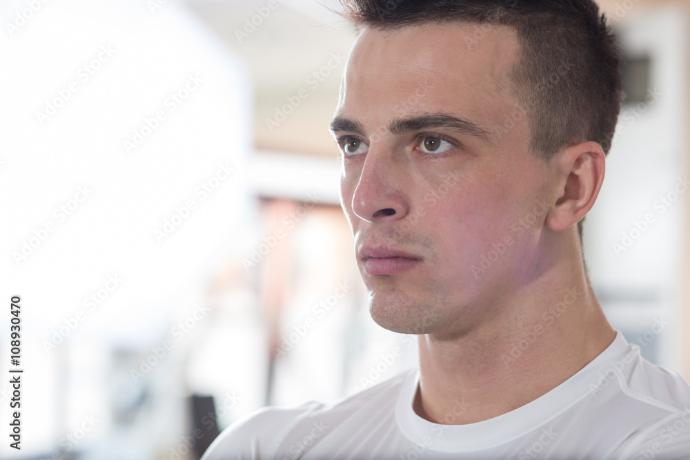 Sporty Man Resting In A Gym. Portrait Of A Young Muscular Sporty Sporty Man Resting In A Gym. Portrait Of A Young Muscular Sporty