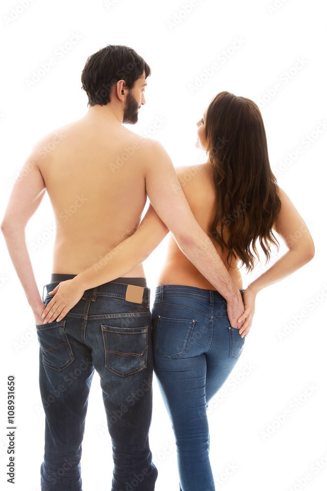Couple holding their hands in each other pocket. Couple holding their hands in each other pocket.