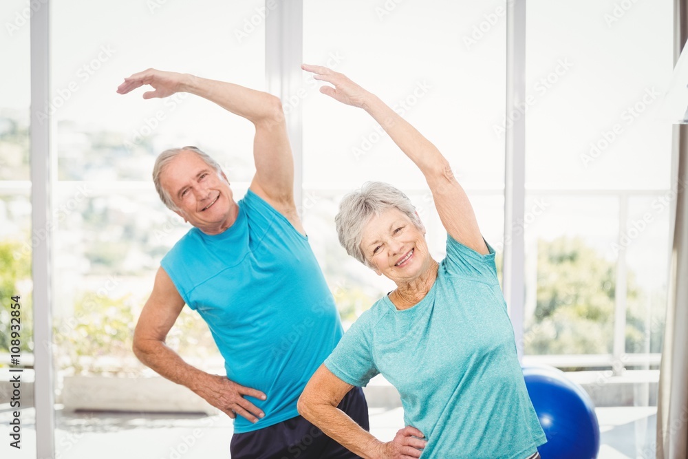 Portrait of senior couple exercising Portrait of senior couple exercising