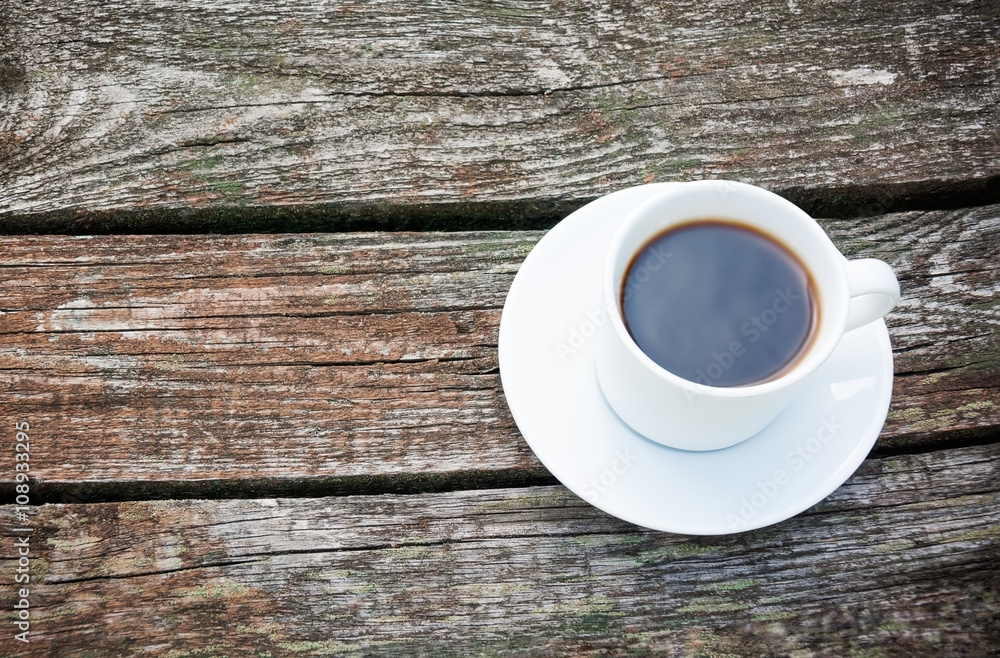 Coffee cup on wooden background Coffee cup on wooden background