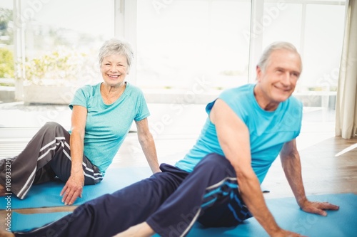 Senior couple doing yoga